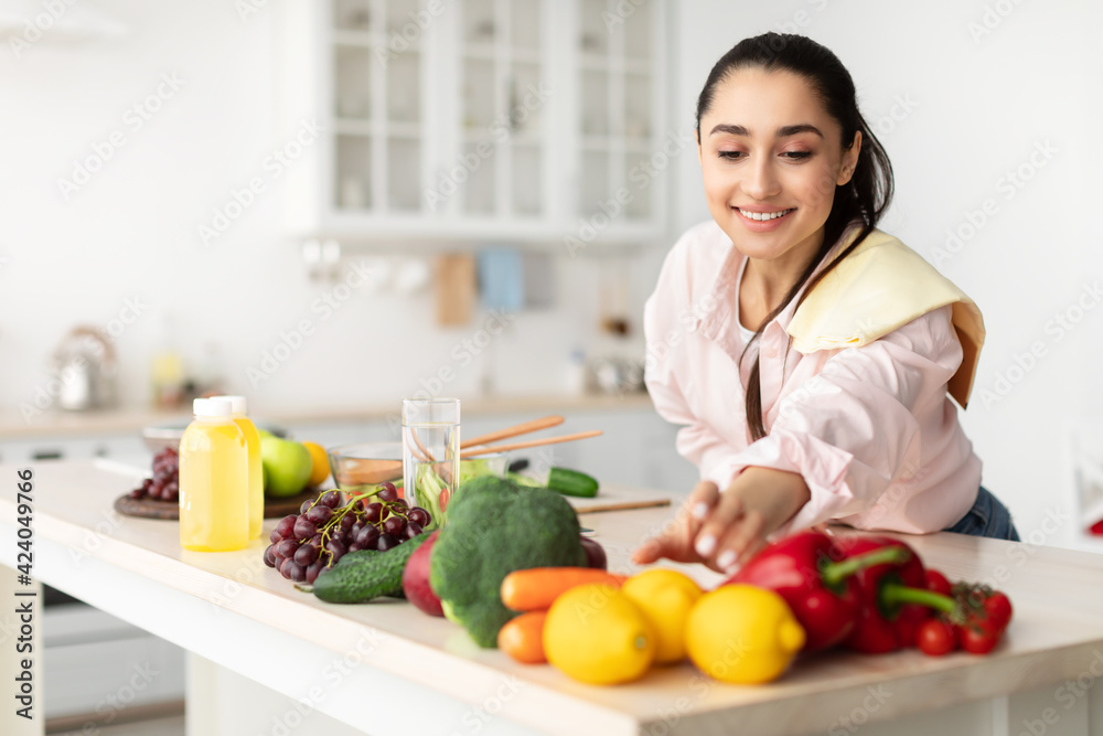 Healthy Food To Boost Your Immune System. Woman cooking salad Healthy Food To Boost Your Immune System. Woman cooking salad