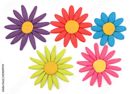 Five colorful plasticine flowers.