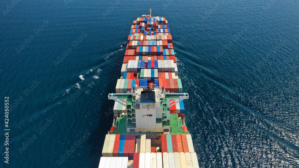 Aerial drone photo of container cargo ship in import export business commercial trade logistic and transportation in the open sea, Container cargo freight shipping.