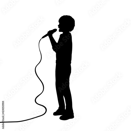 Silhouette boy singing into a microphone