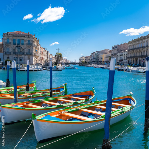 Fototapeta Naklejka Na Ścianę i Meble -  Sète in France, traditional boats moored at the quay in the city centre

