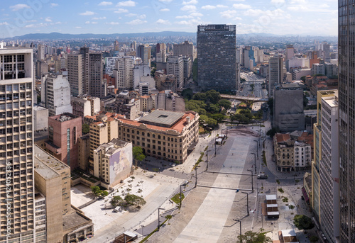 Beautiful aerial view of corporate buildings in Vale do Anhangabau street, São Paulo city centre skyline in sunny summer day. Concept of urban, cityscape, metropolis, business, architecture. Brazil.