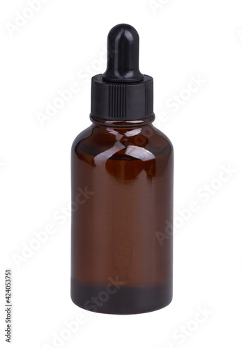 Anti aging serum with collagen and peptides in dark glass bottle with dropper isolated on a white background with clipping path. Anti-age product, luxury body care and organic science concept. 