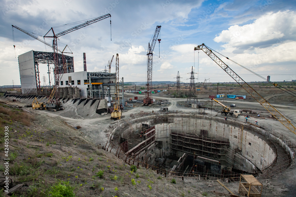 Rudny, Kostanay region, Kazakhstan-May 28 2012: Sokolovo-Sarbay Mining and processing plant. New factory building construction site panorama. Rudny, Kostanay region, Kazakhstan-May 28 2012: Sokolovo-Sarbay Mining and processing plant. New factory building construction site panorama.