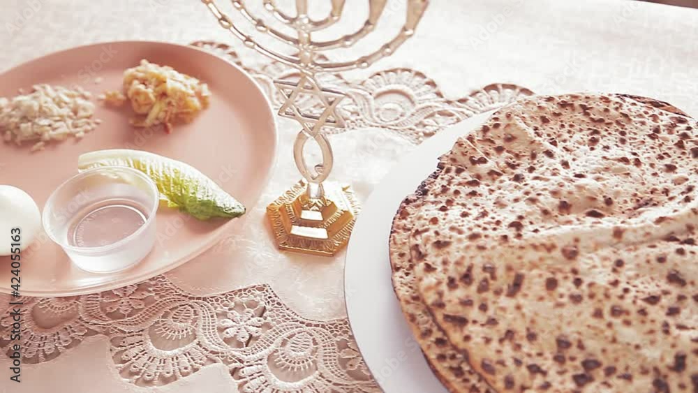 Matza shmura round for Easter seder next to kiara rotates in a circle Matza shmura round for Easter seder next to kiara rotates in a circle