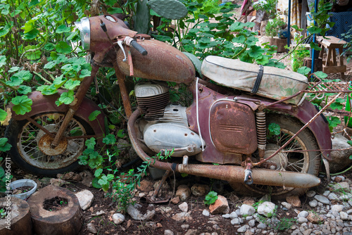 Scrapped old nostalgic rusty motorcycle © Bulent