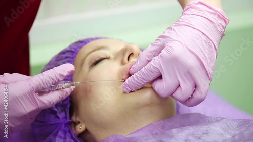 lip augmentation procedure. beauty injections. Plastic surgery