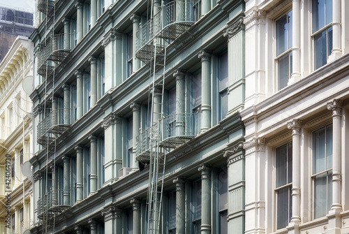 Row of old buildings with iron fire escapes, New York City, USA.