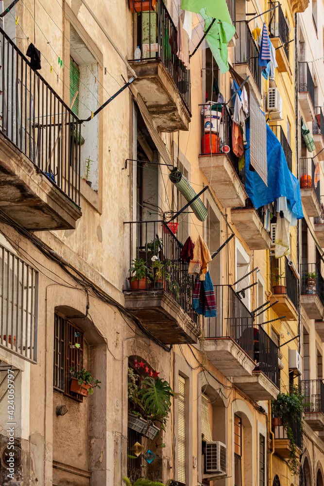 balcony in narrow street of Barcelona, catalunya, spain