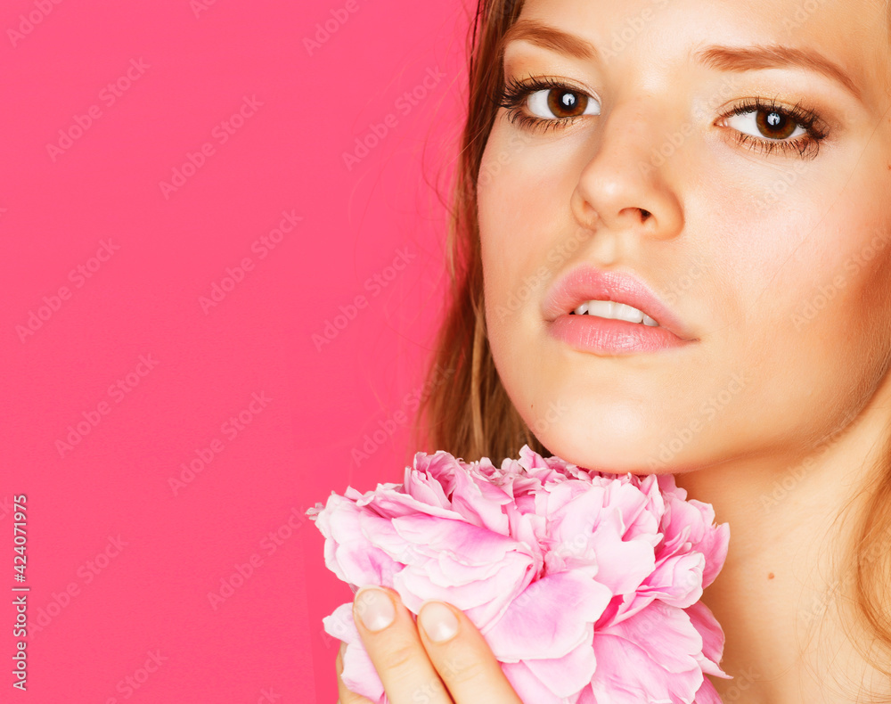young beauty woman with flower peony pink closeup makeup soft tender gentle look