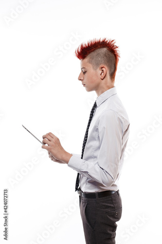 Teenager with tablet computer on white background