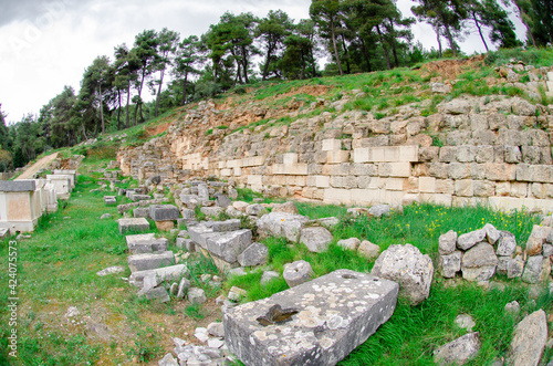 great retaining wall and the votive podestals at the sanctuary of Amphiaraus of Oropos Greece. photo