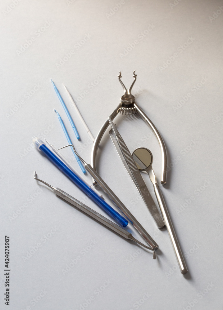 dental instruments on a white background dental instruments on a white background