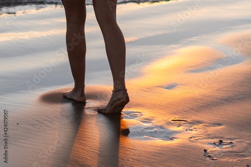 woman walking on the beach