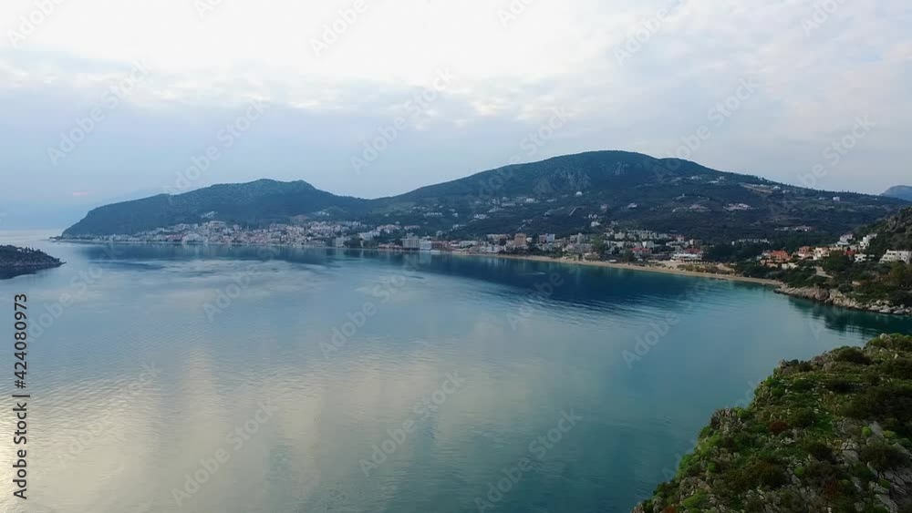 Aspect of Tolo, Greece, and its beautiful turquoise sea on a calm day Aspect of Tolo, Greece, and its beautiful turquoise sea on a calm day