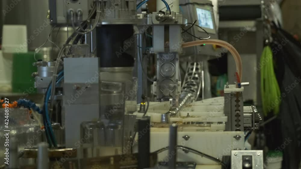 Automated Equipment and Machinery On A Microbrewery Beer Canning Line Automated Equipment and Machinery On A Microbrewery Beer Canning Line