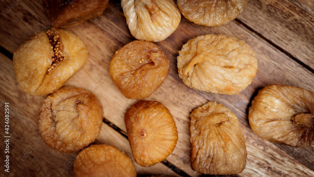 Dried figs on a wooden board - studio photography Dried figs on a wooden board - studio photography