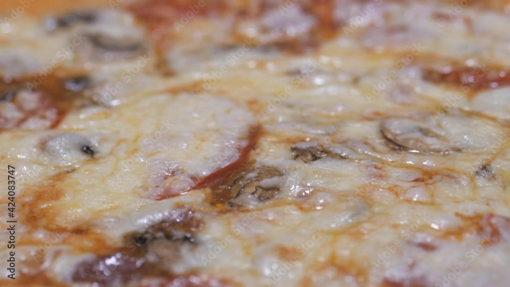 Large round pizza with a cheese side in a box. Large round pizza with a cheese side in a box.