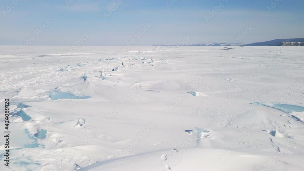 Ice Hummocks at Frozen Baikal Lake in Winter. Aerial View Ice Hummocks at Frozen Baikal Lake in Winter. Aerial View