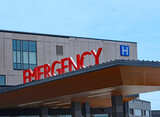 Emergency sign above entrance to hospital emergency department