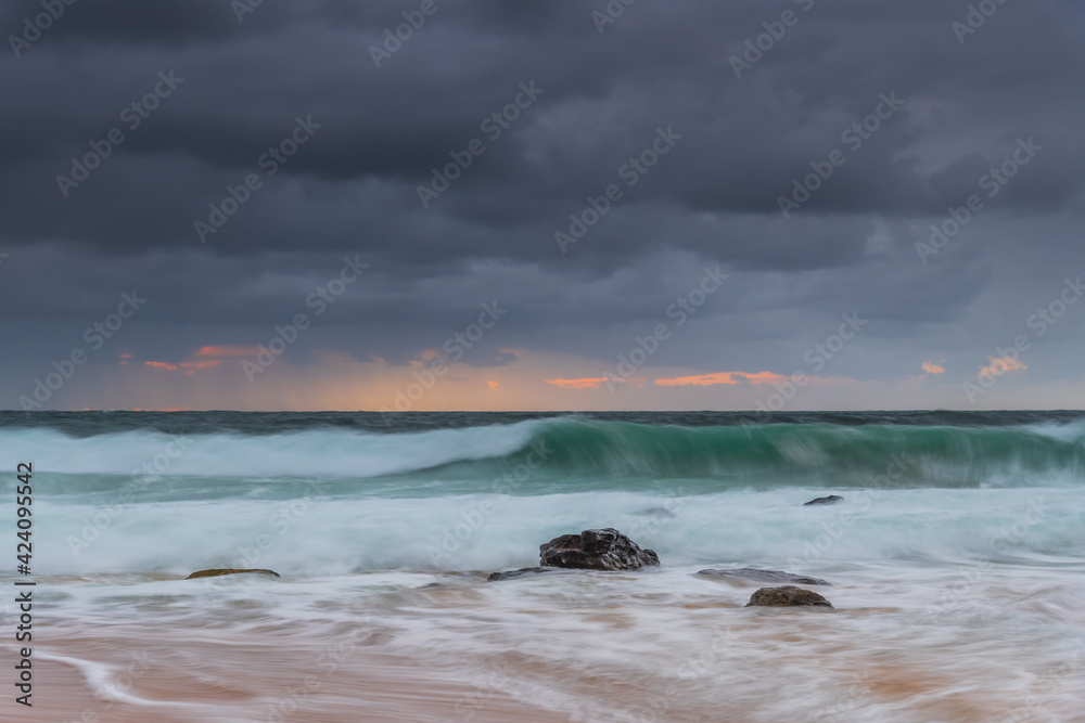 A moody overcast sunrise seascape