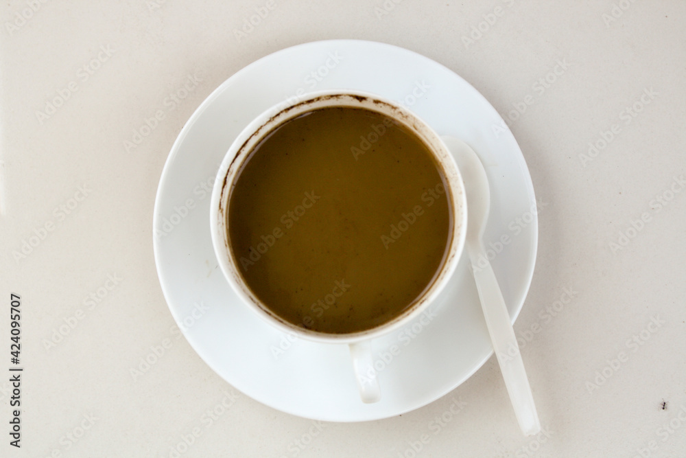 cup of coffee on table cup of coffee on table