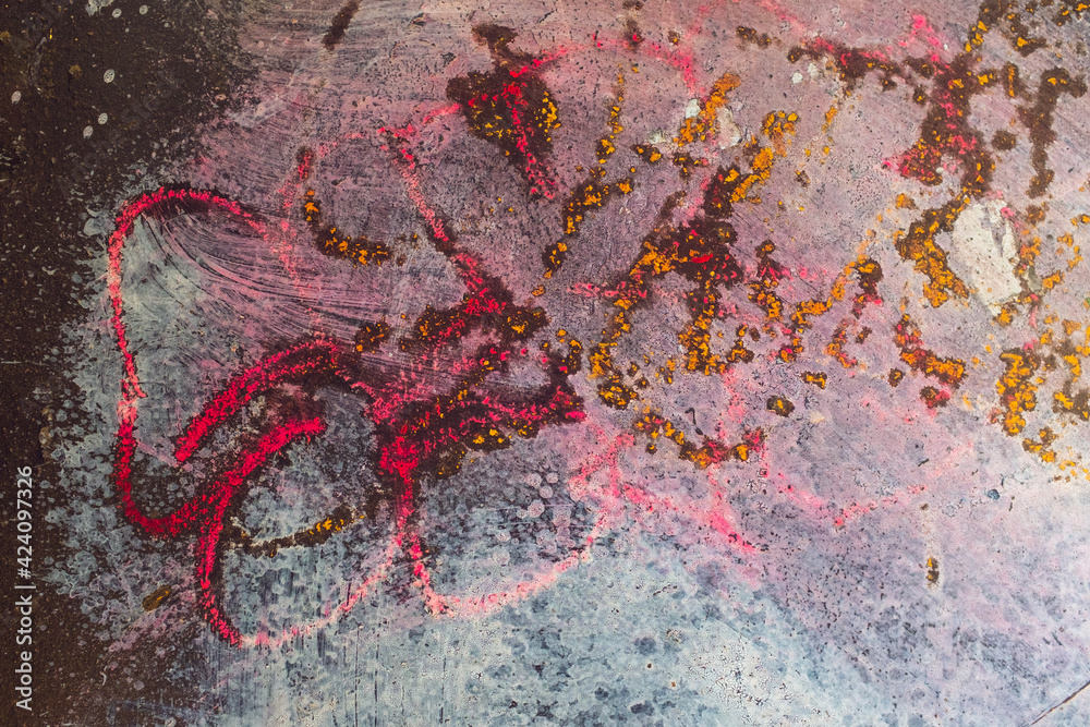 Fototapeta premium An abstract texture in red, gold, and pink