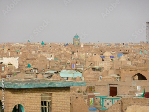 Najaf, Iraq - april 27, 2015:  photos of the great cemetery in najaf city photo