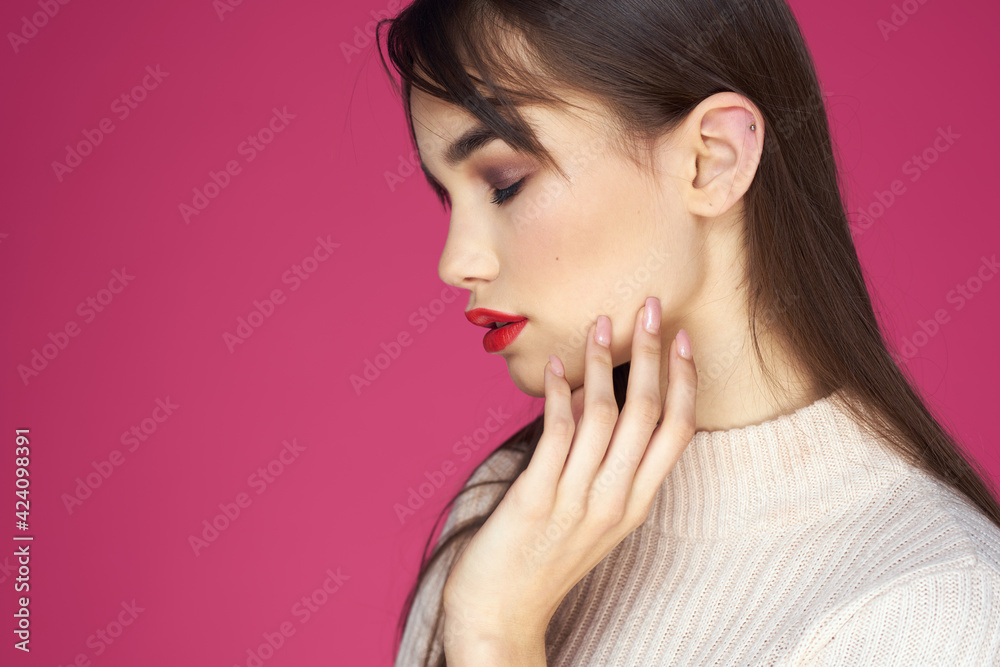 Woman with red lips bright makeup white blouse long hair pink background Woman with red lips bright makeup white blouse long hair pink background