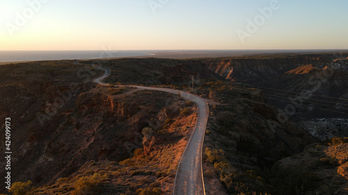 Amazing route over the top of the Charles Knife canyon road with an great aerial view In Exmouth, Western Australia on sunset sunrise.