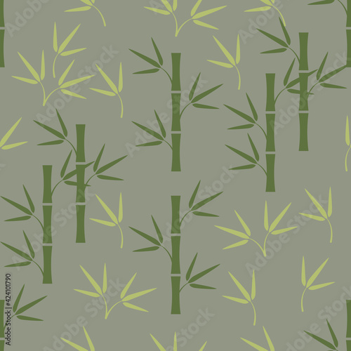 Green bamboo stems with leaves on light green square background seamless pattern