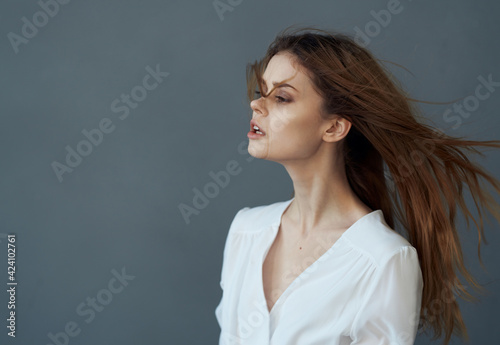 elegant woman in white dress luxury studio gray background