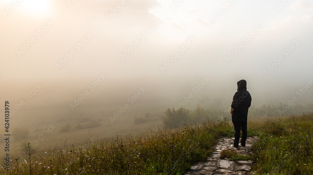 person watching the sunrise