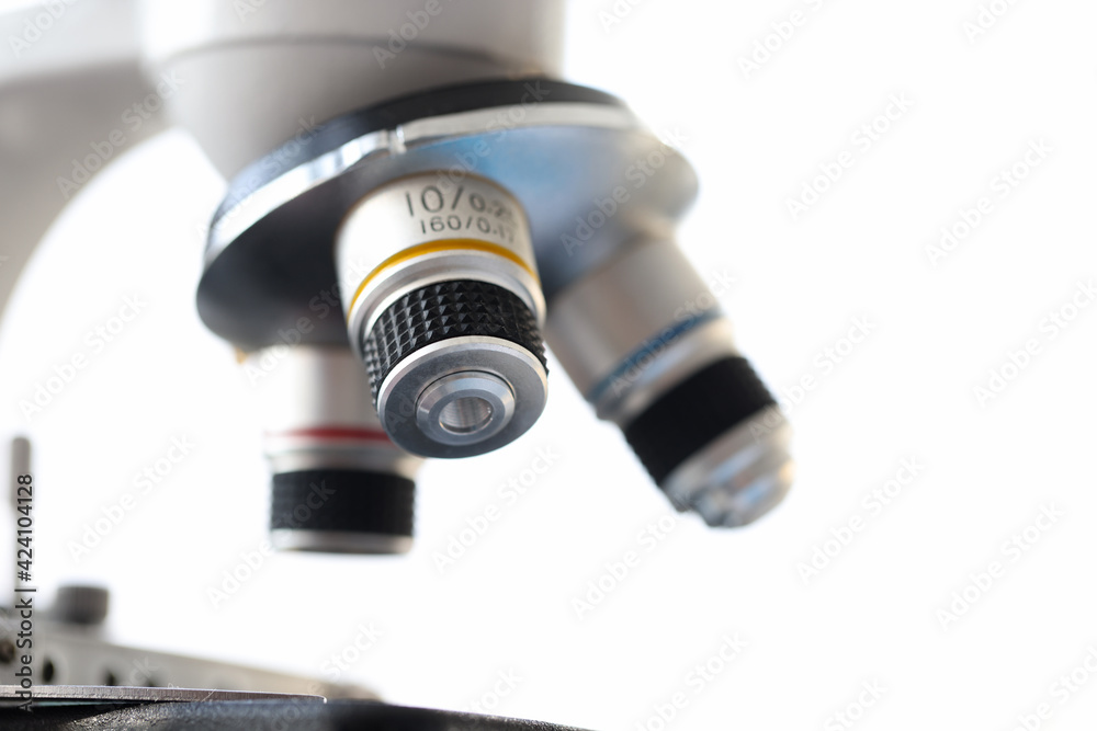 Closeup of head of biological microscope in laboratory Closeup of head of biological microscope in laboratory