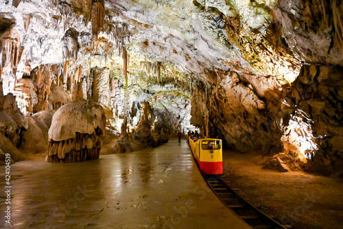 Photography Underground tourist train in Postojna cave, Slovenia