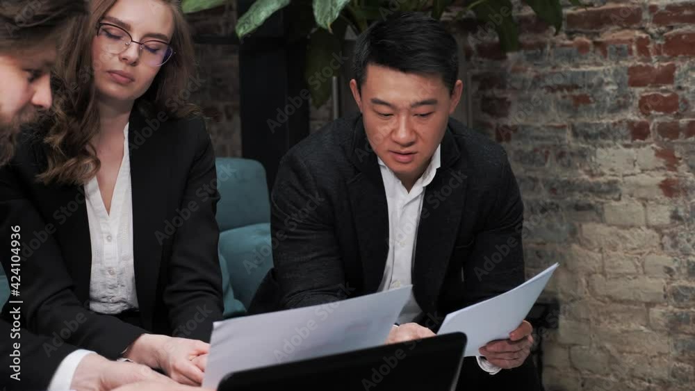 Startup investment confirmation meeting between asian investor and caucasian female startupper businesswoman colleagues shaking hands wearing casual formal business clothing in modern office workplace Startup investment confirmation meeting between asian investor and caucasian female startupper businesswoman colleagues shaking hands wearing casual formal business clothing in modern office workplace