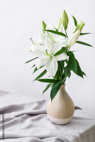 Wallpaper Mural Vase with beautiful lily flowers on table in room Torontodigital.ca