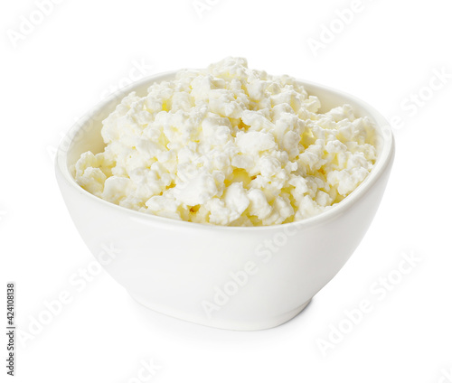 Bowl with cottage cheese on white background