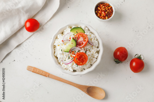 Canvastavla Bowl with cottage cheese on light background
