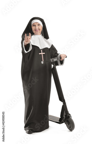 Cool senior nun with scoote...