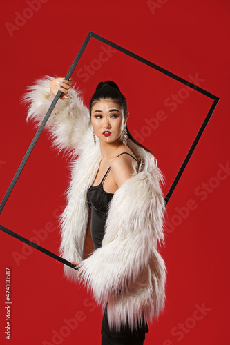 Portrait of stylish Asian w...