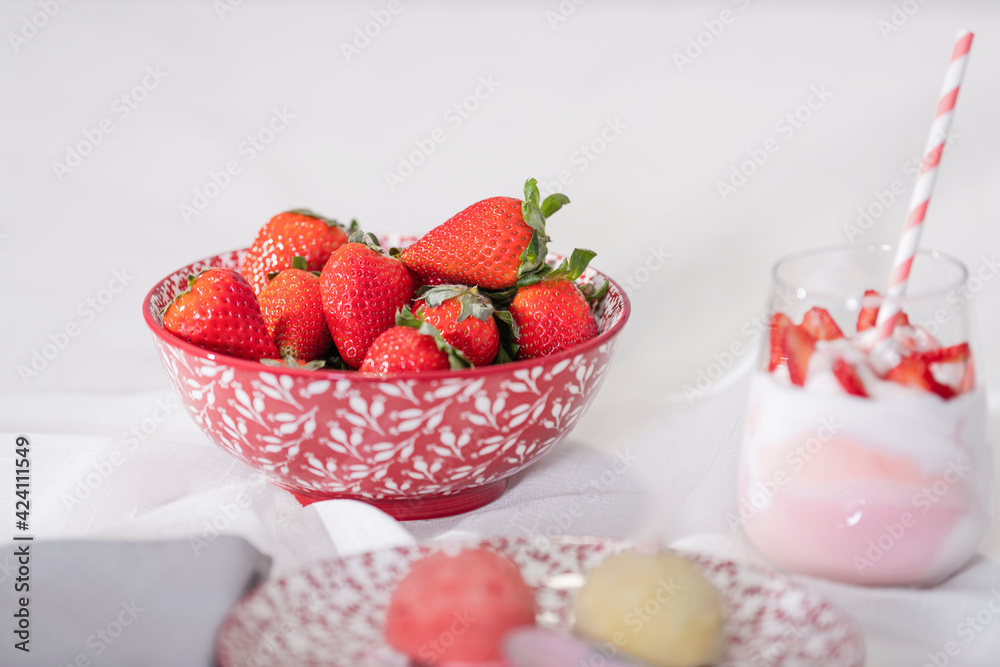 Bowl of delicious strawberries with other sweets Bowl of delicious strawberries with other sweets