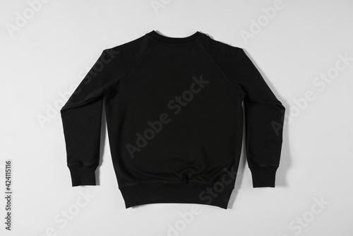 Black casual sweatshirt for kids on grey background