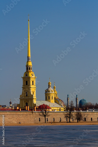 Spring sunny day on the Neva river.  Peter and Paul Fortress on Hare Island, Russia. The Saint Petersburg Mosque in the distance.