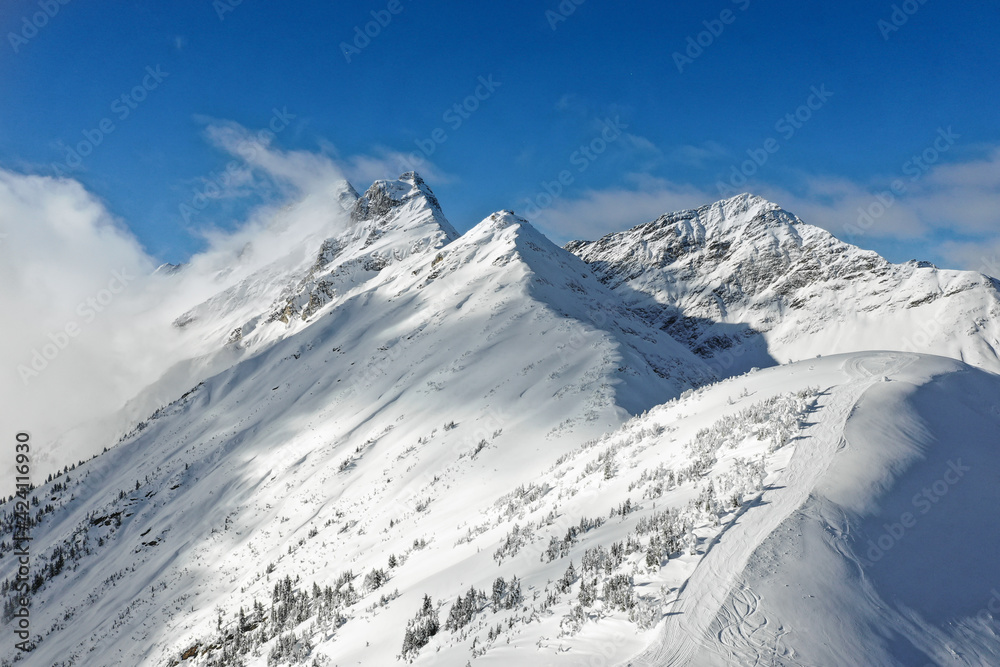 snow covered mountains in Alpine Terrain