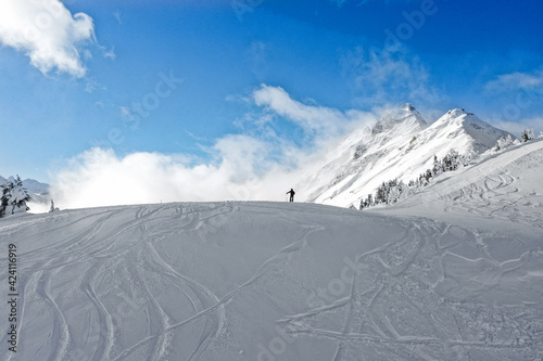 Alpine touring skiing in the mountains photo