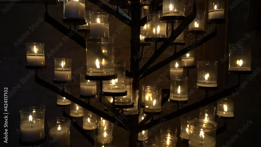 candlestick of burning candles in catholic church candlestick of burning candles in catholic church