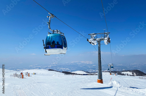 Gondola lift at ski resort in winter