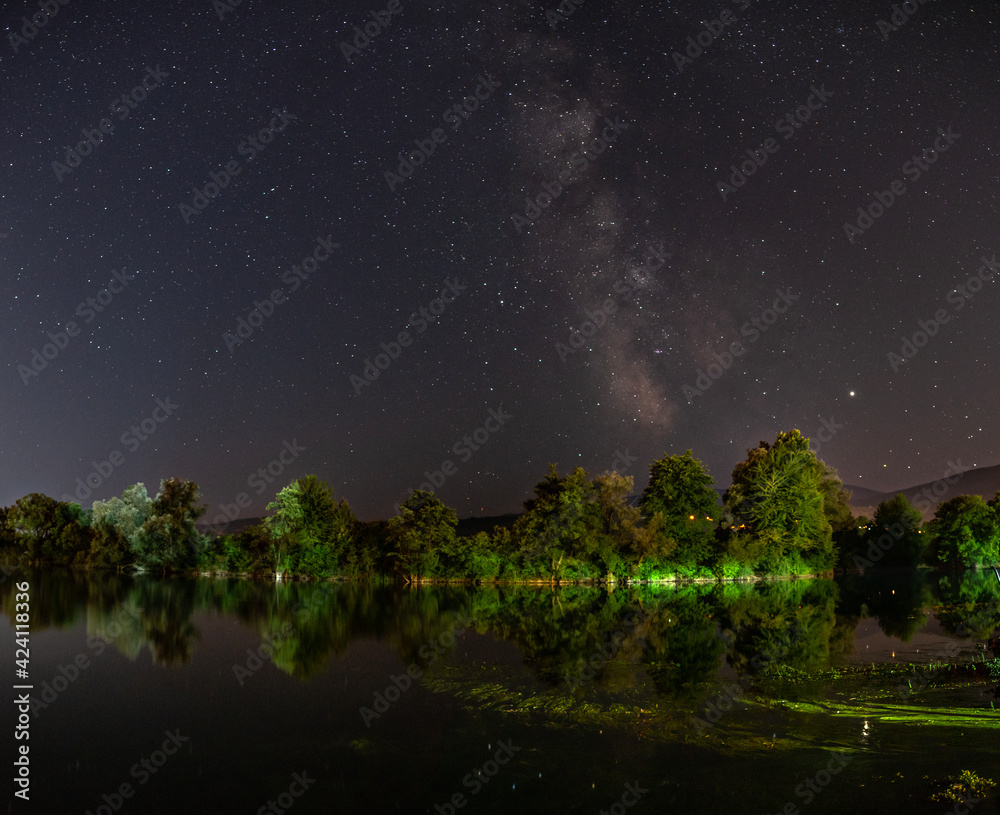 milky way with trees on the river milky way with trees on the river
