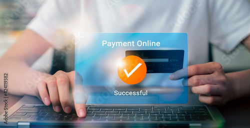 Canvas Print Woman using laptop and holding credit card with payment online successful screen, banking and shopping online